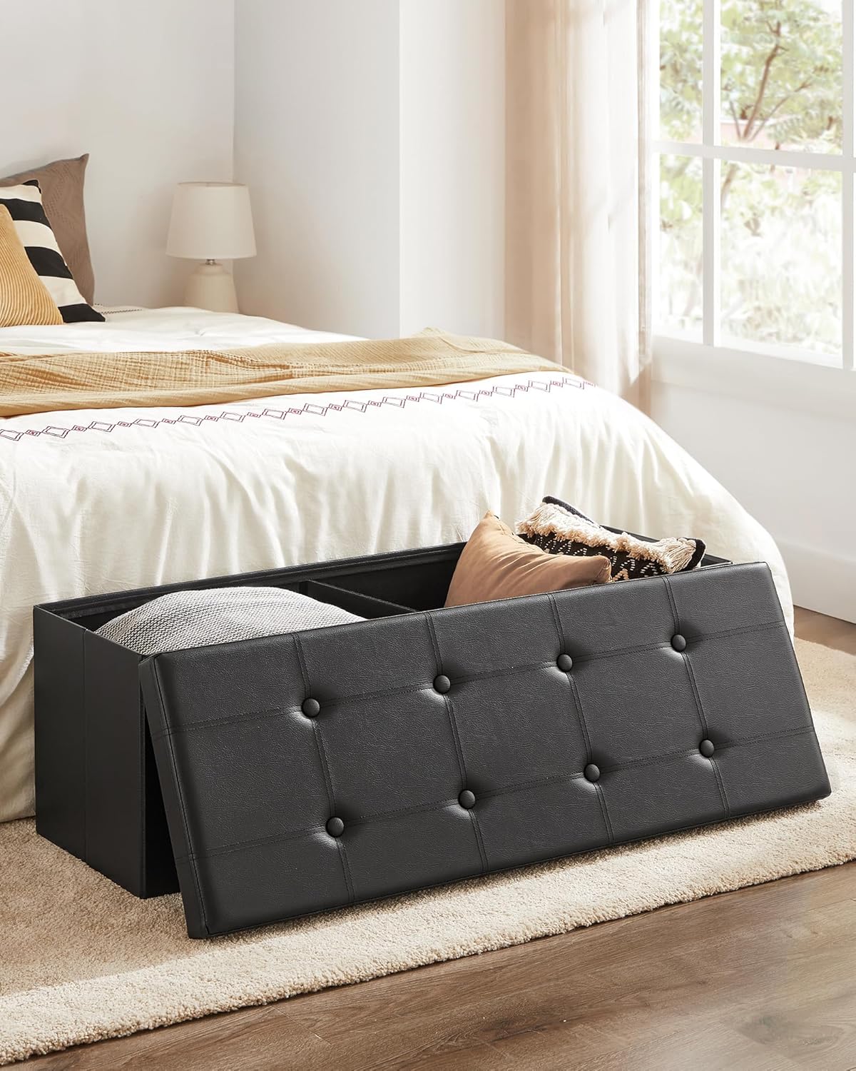 SONGMICS MAZIE Collection - 43 Inches Folding Storage Ottoman Bench, Ottoman with Storage, Foot Rest Stool, Load 660 lb, for Living Room, Synthetic Leather, Black ULSF701